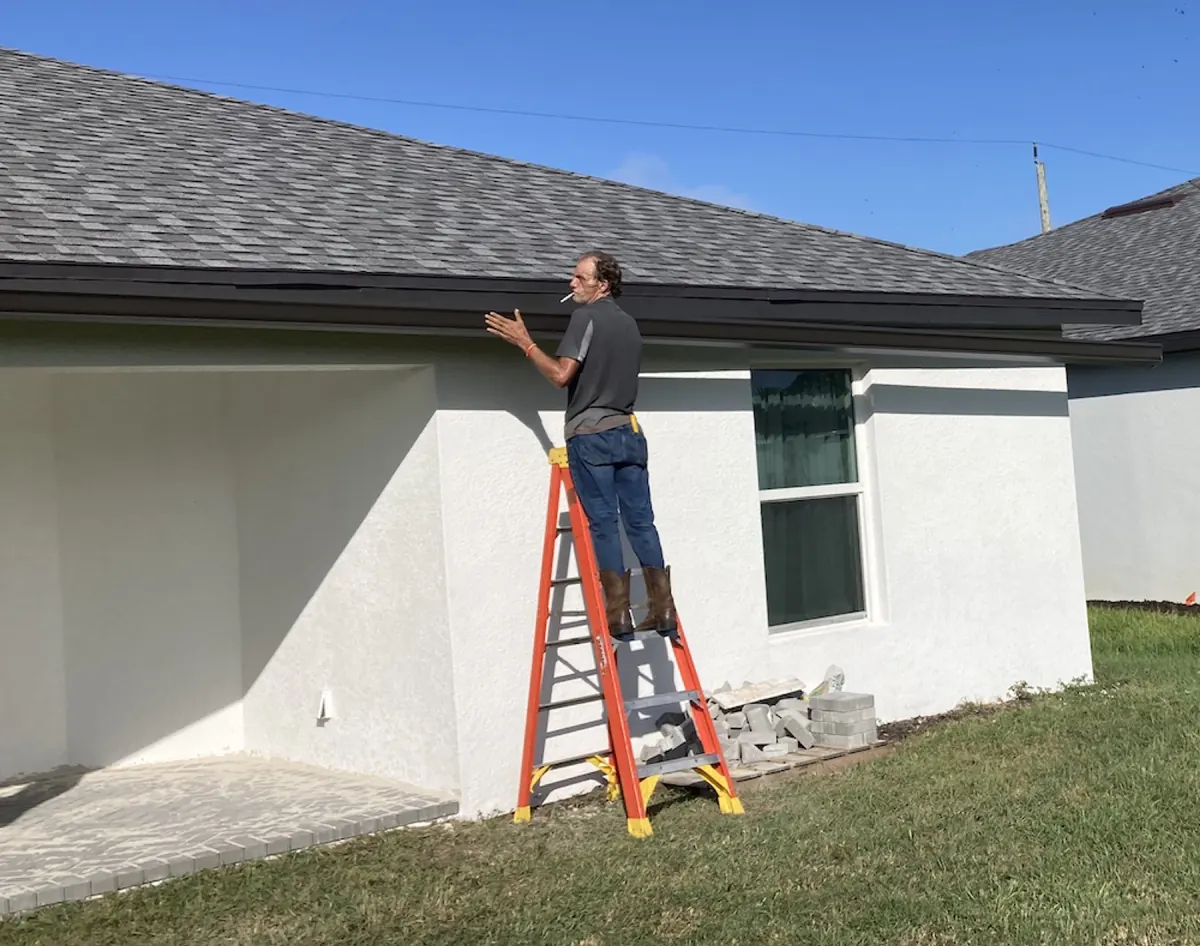 WWJD crew working along a Southwest Florida roofline