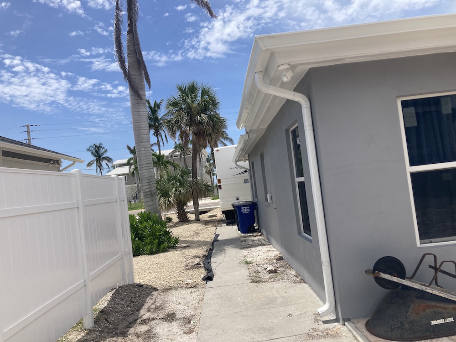 Seamless gutters and downspout installed on a Fort Myers, FL home
